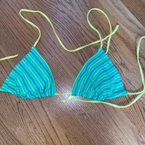 Vibrant blue, yellow, green triangle top swimsuit for the summer